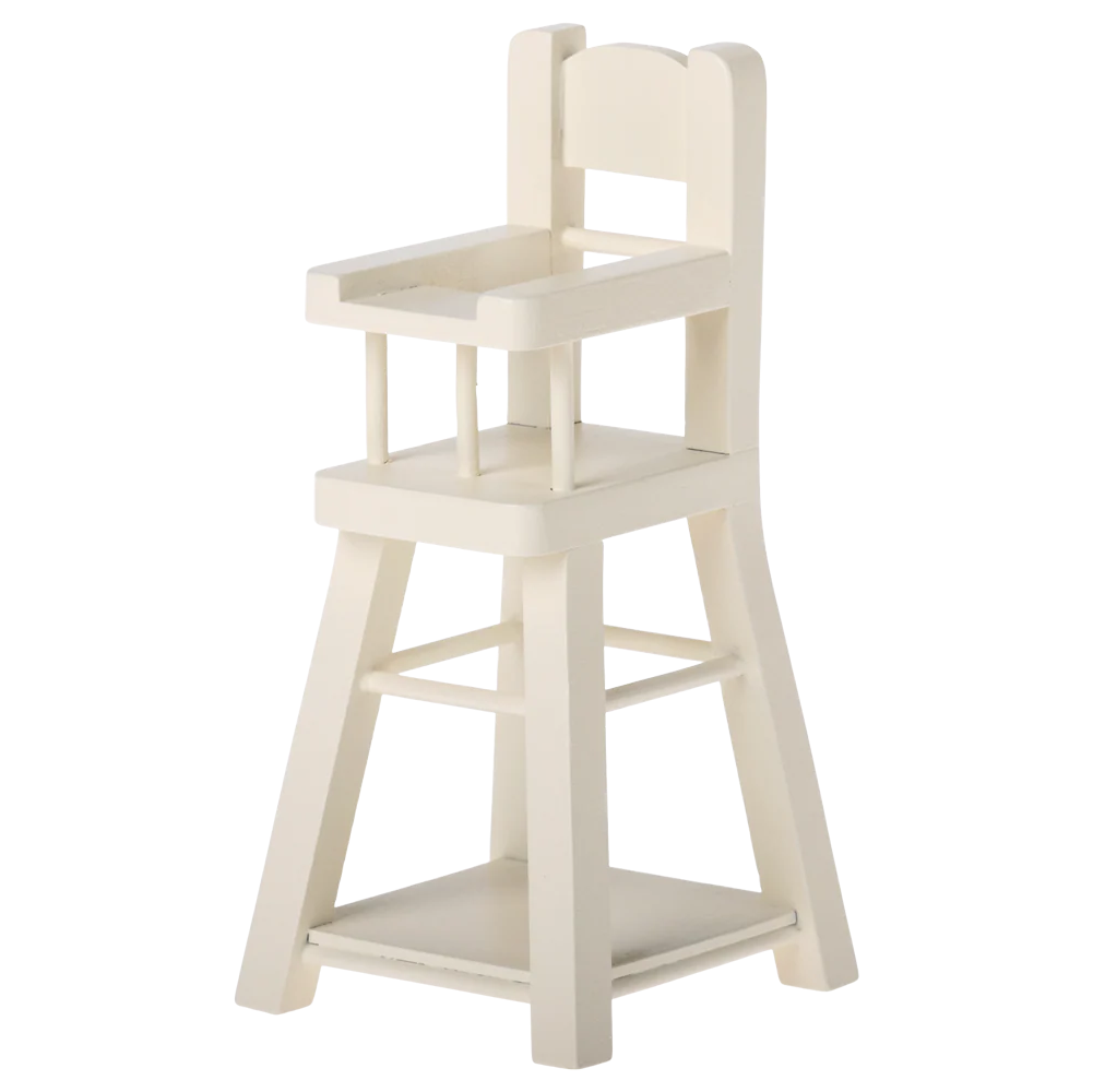 White wooden high chair on a white background