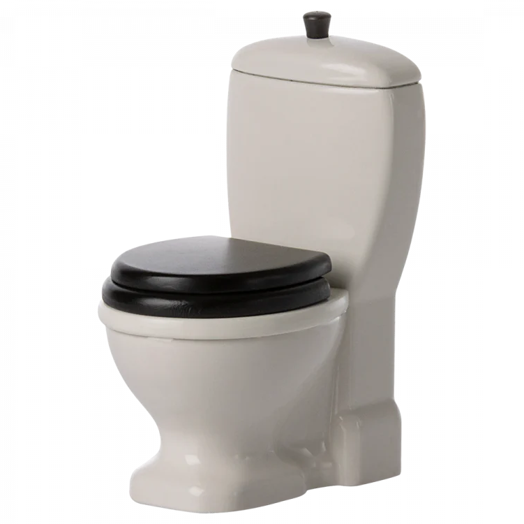 A small, toy-sized off-white colored mouse toilet with a black seat, designed for play and fits the Maileg mice figures.