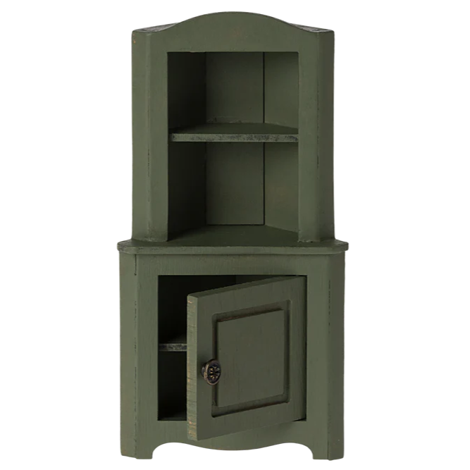 A dark green dollhouse corner cabinet with a vintage finish.