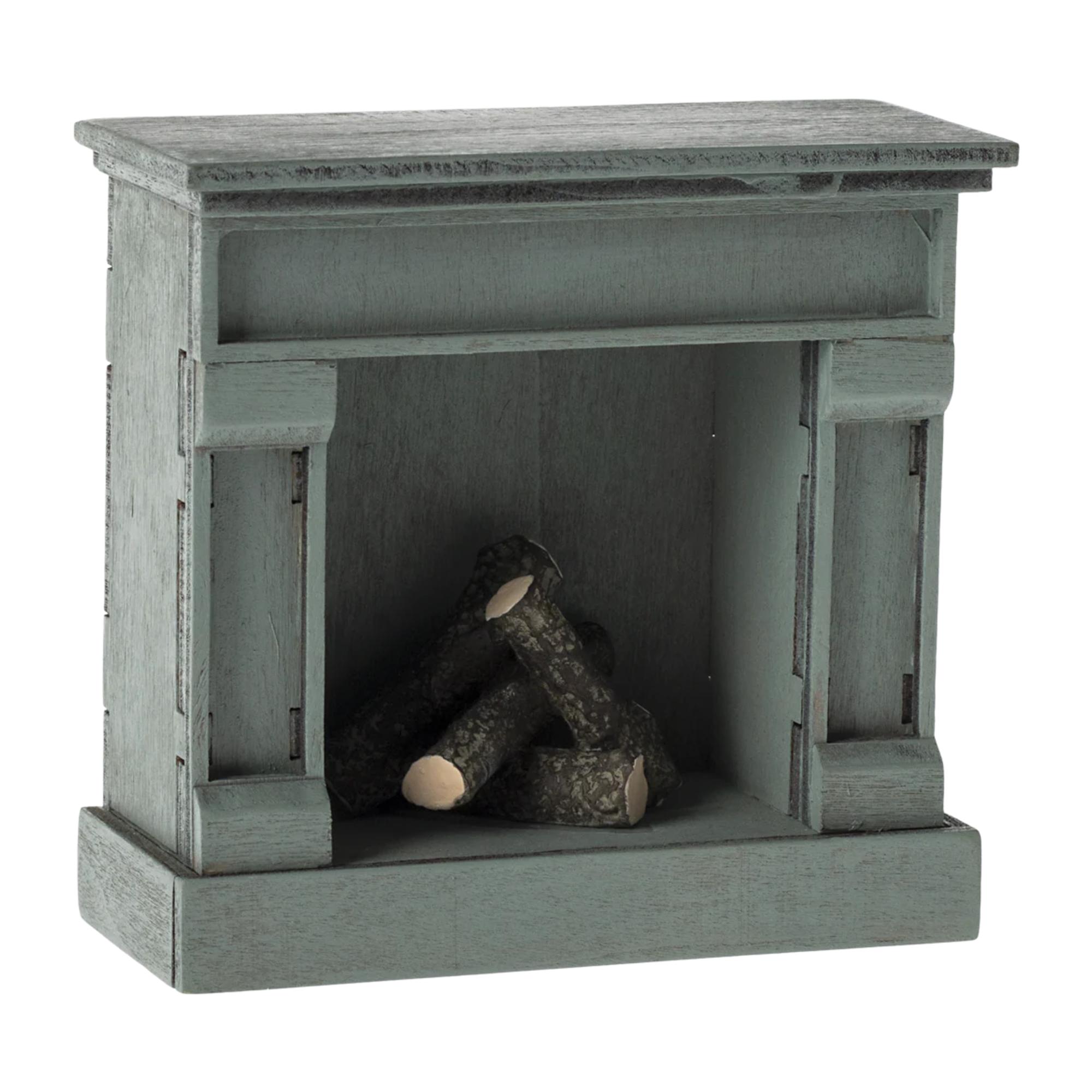 Small wooden fireplace with logs inside on a white background