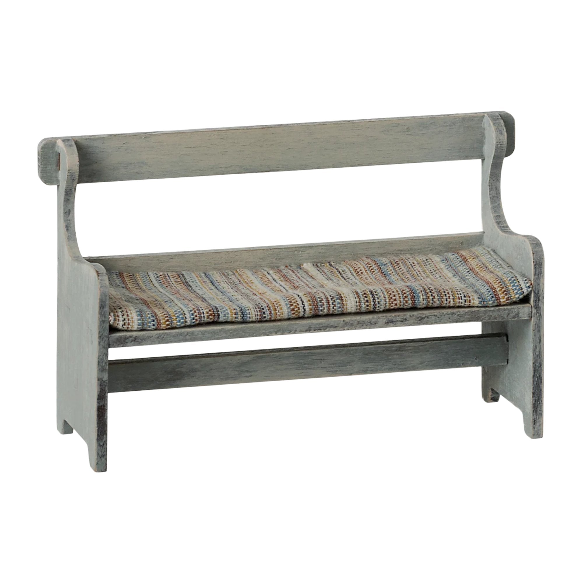 Wooden bench with a striped cushion on a white background