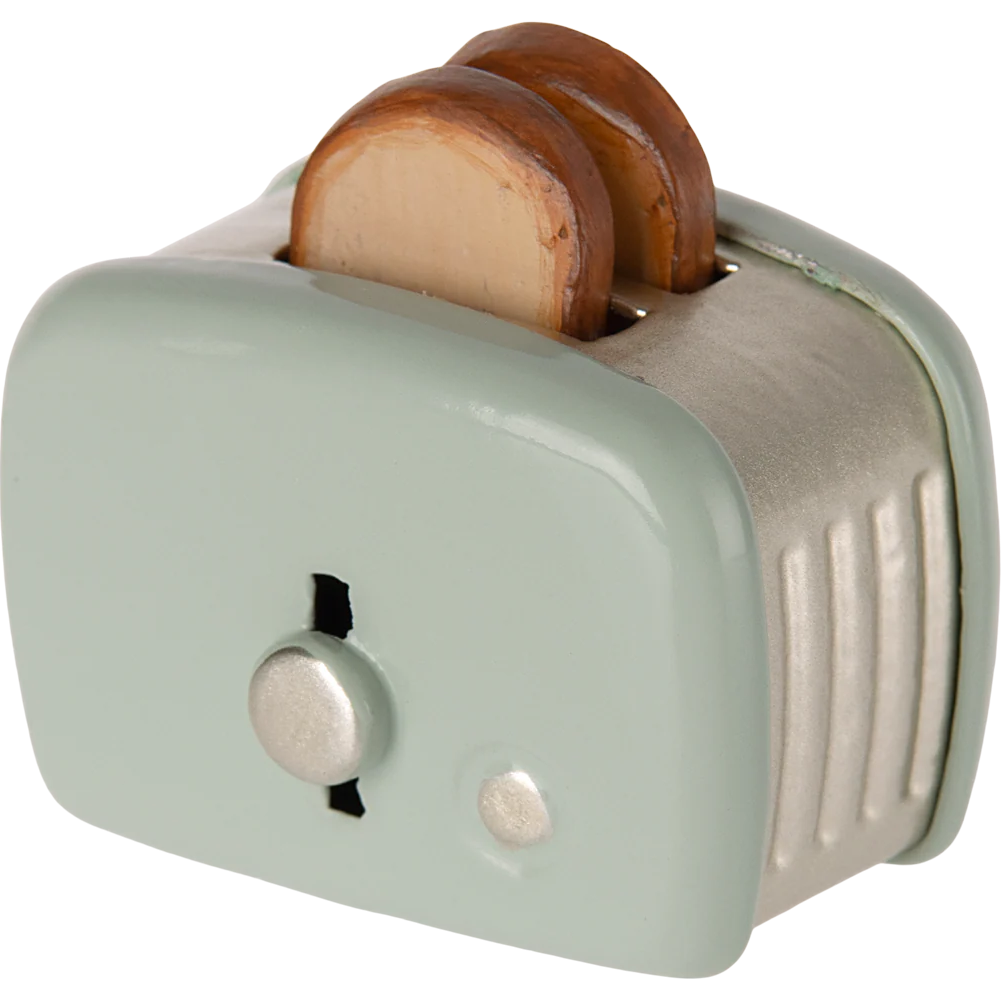 Small toaster with two slices of bread on a white background