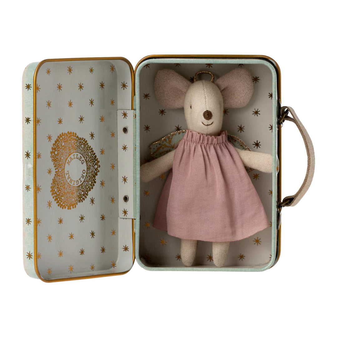 Stuffed mouse toy in a decorative tin box with gold star patterns