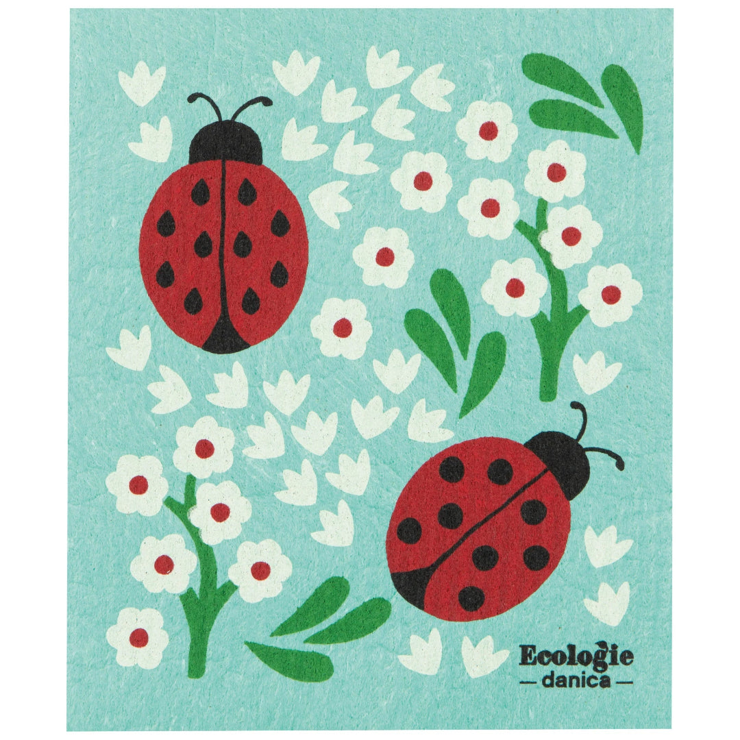 Sponge cloth with ladybug and flower design on a blue background, featuring the brand 'Ecologie danica'.