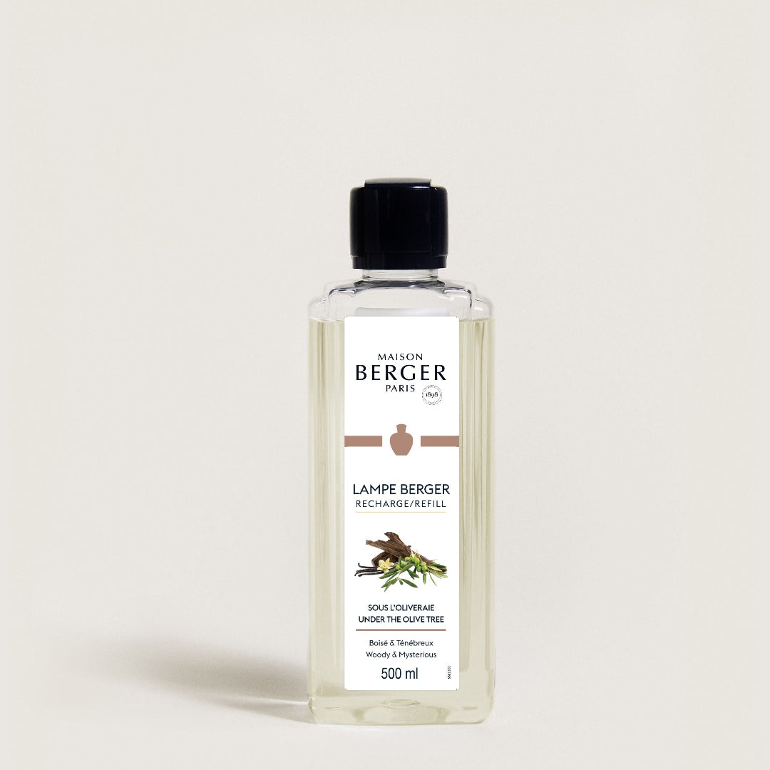 Bottle of Lampe Berger refill on a light beige background