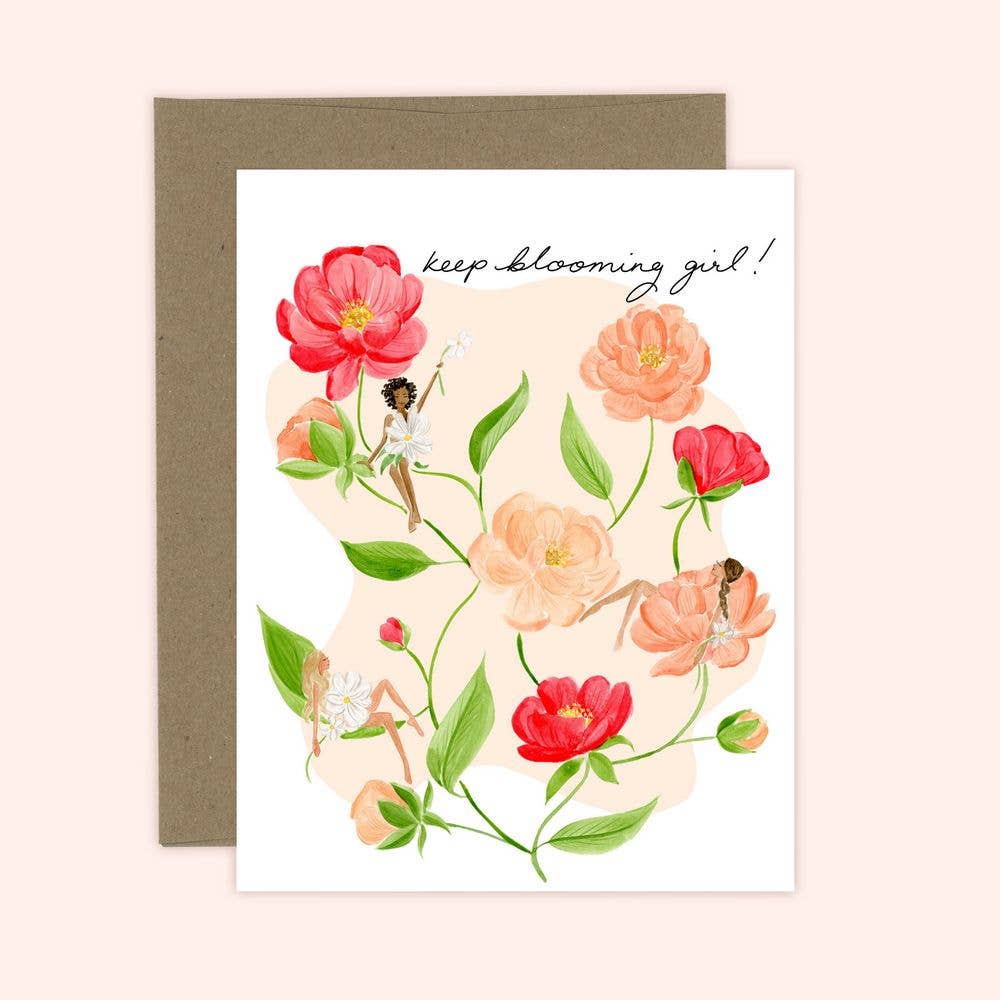 A greeting card with a floral design and a message that reads 'Keep Blooming Girl!' along with a digital print on luxe textured felt paper. The card also includes a white or kraft envelope.