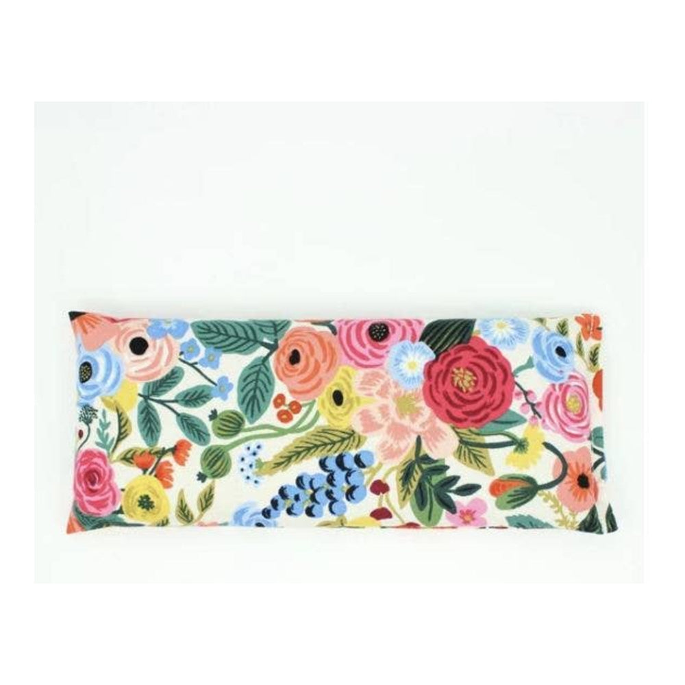 Floral patterned pillow on a white background