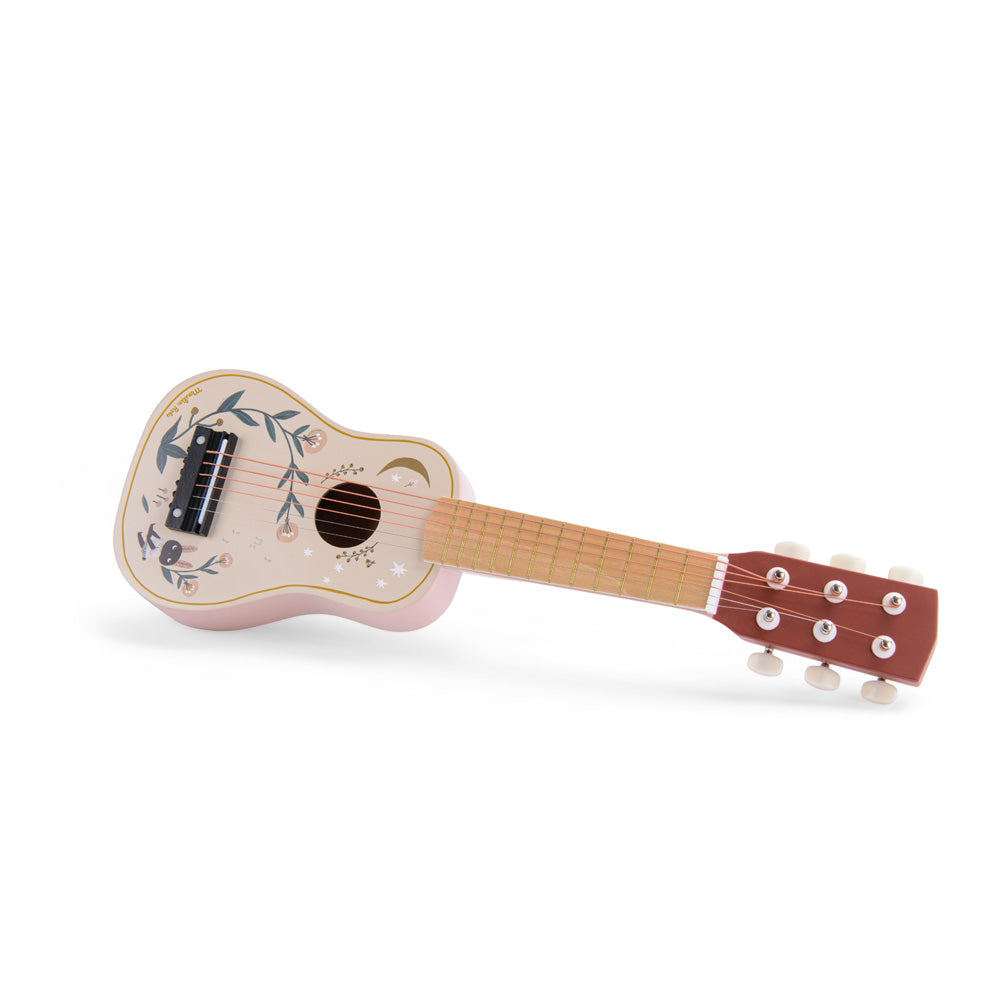 Small guitar with floral design on a white background