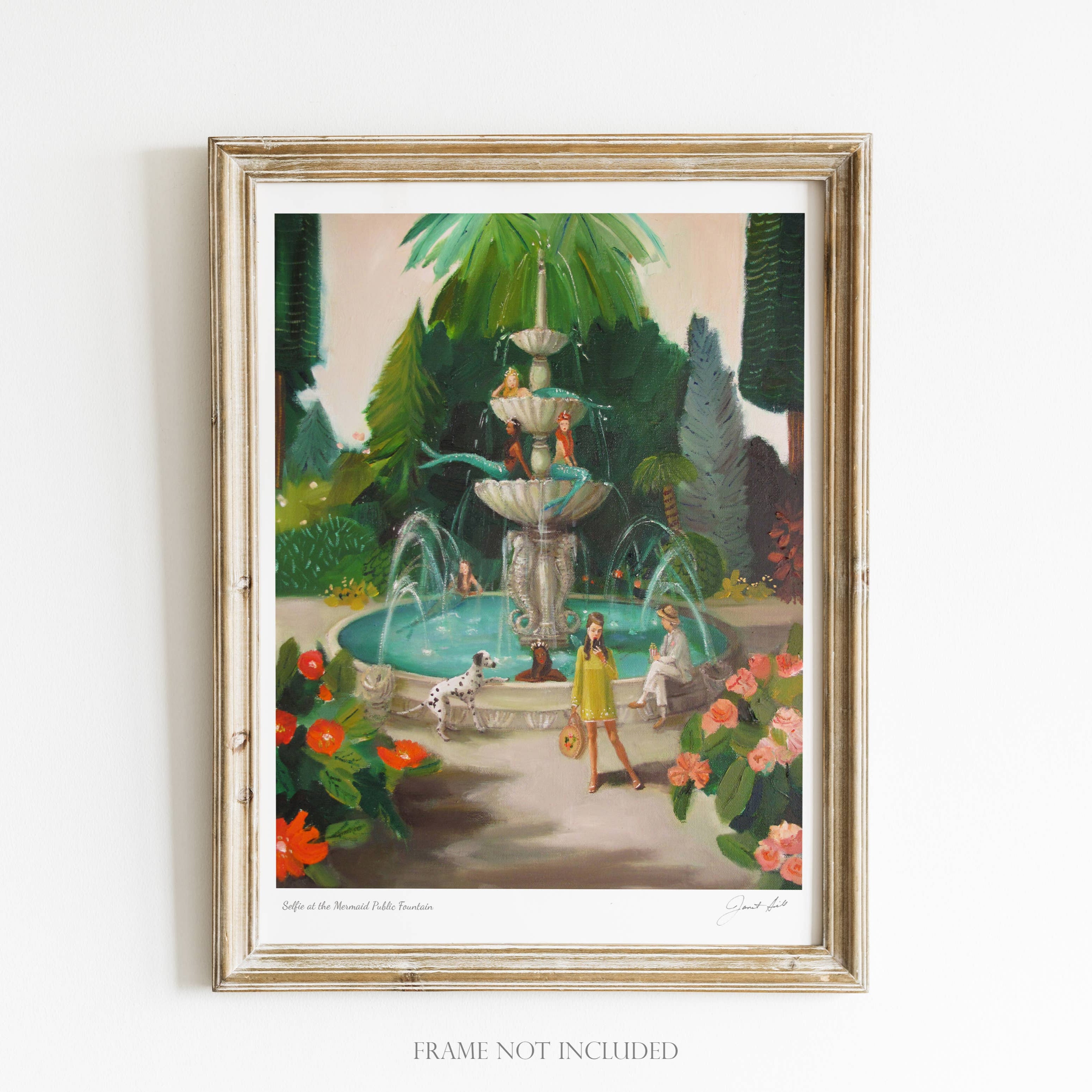 Framed artwork of a garden scene with a fountain and people sitting around it.