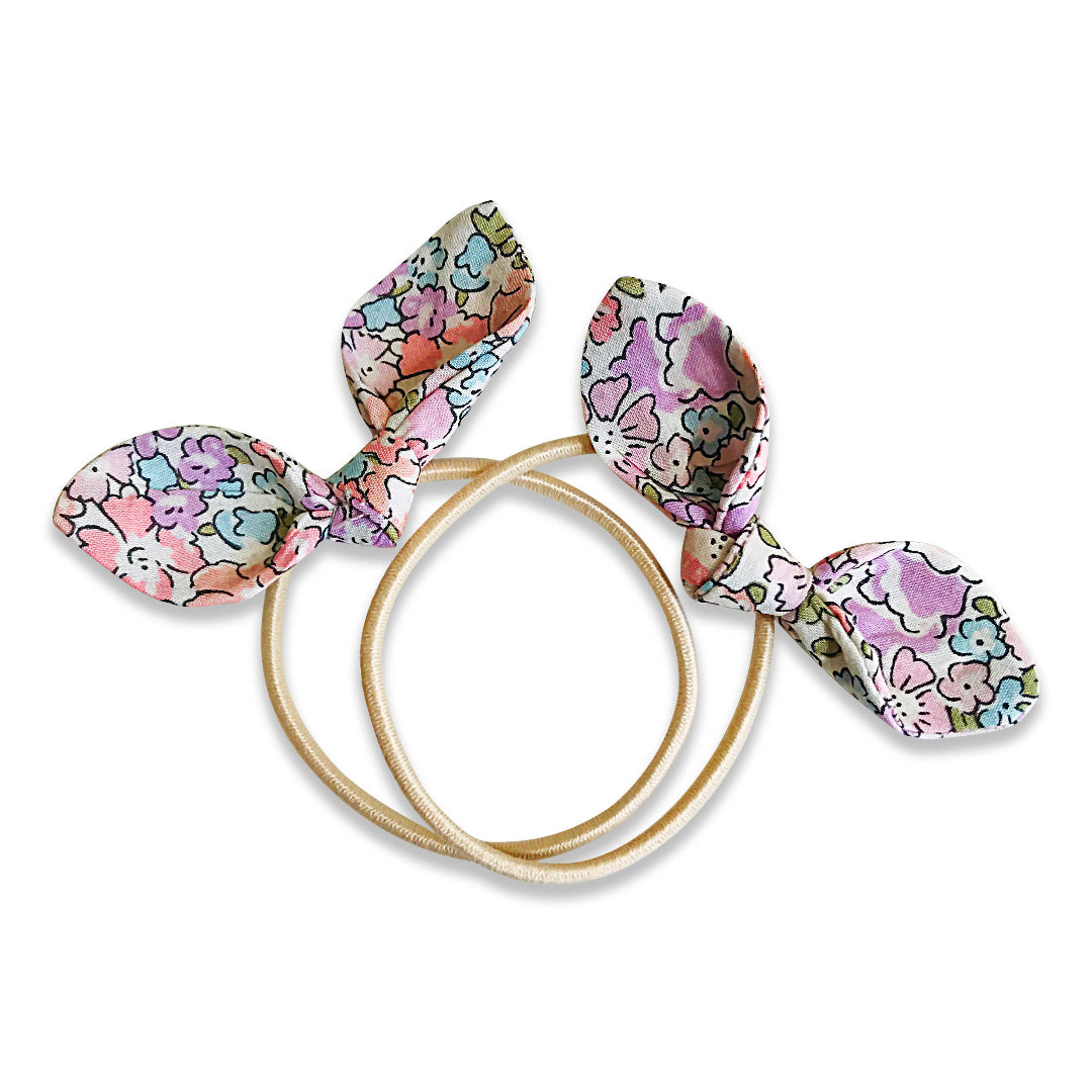 Set of floral-patterned hair ties on a white background