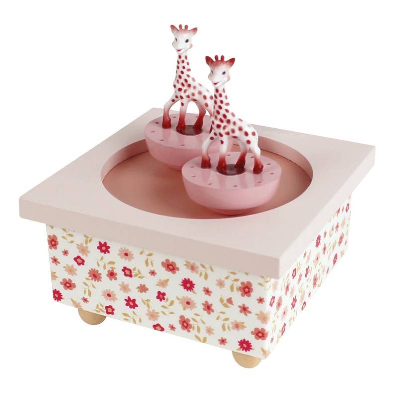 Music box with giraffe figures on a white background