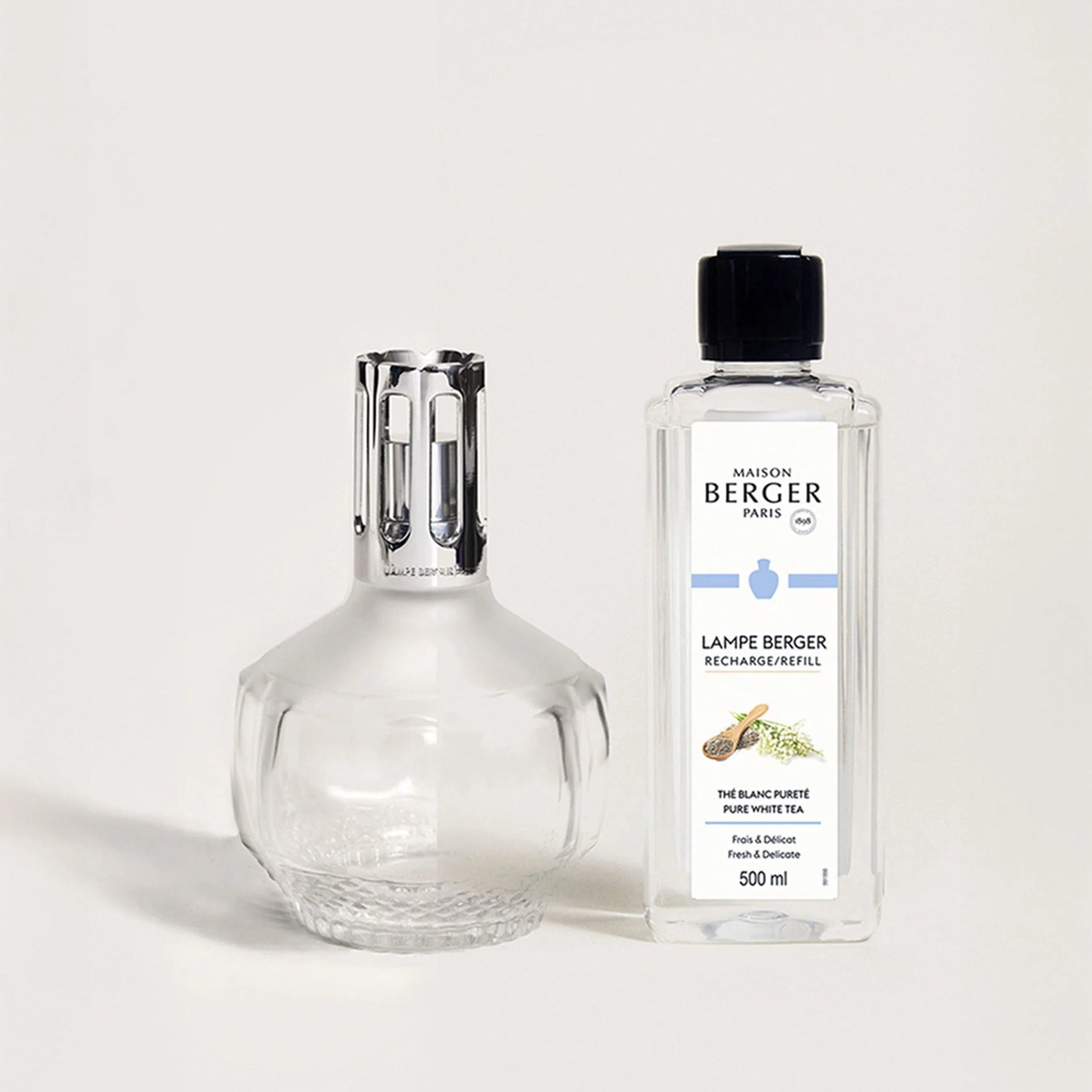 Lampe Berger Paris diffuser and refill bottle on a white background