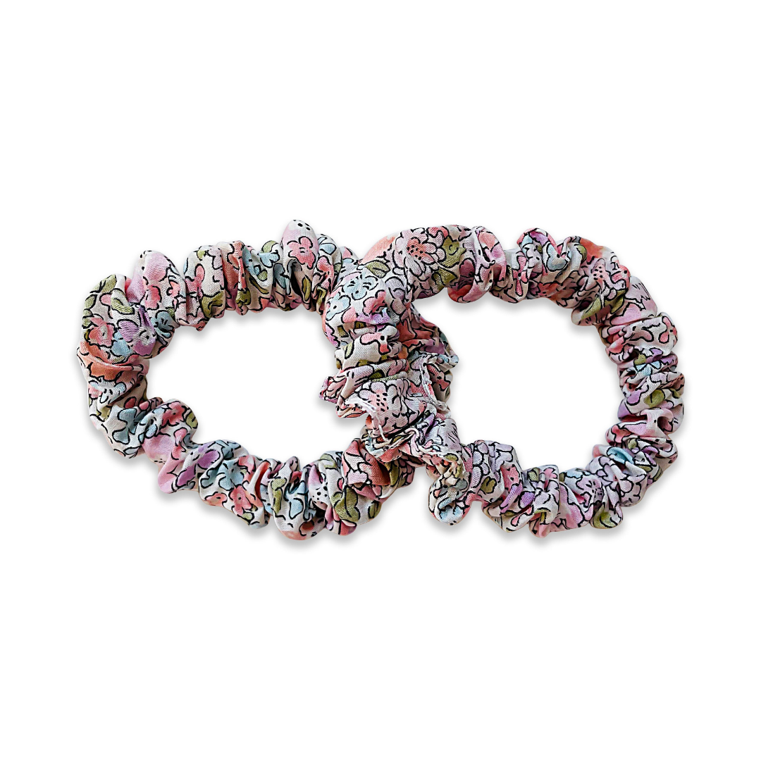 Set of two floral scrunchies on a white background