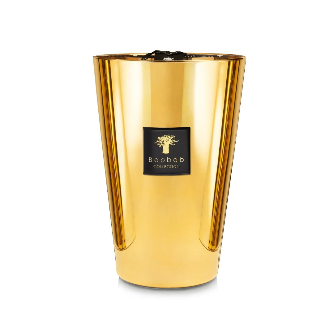 A collection of gold colored candles with glass containers, each with a label reading 'Baobab'.