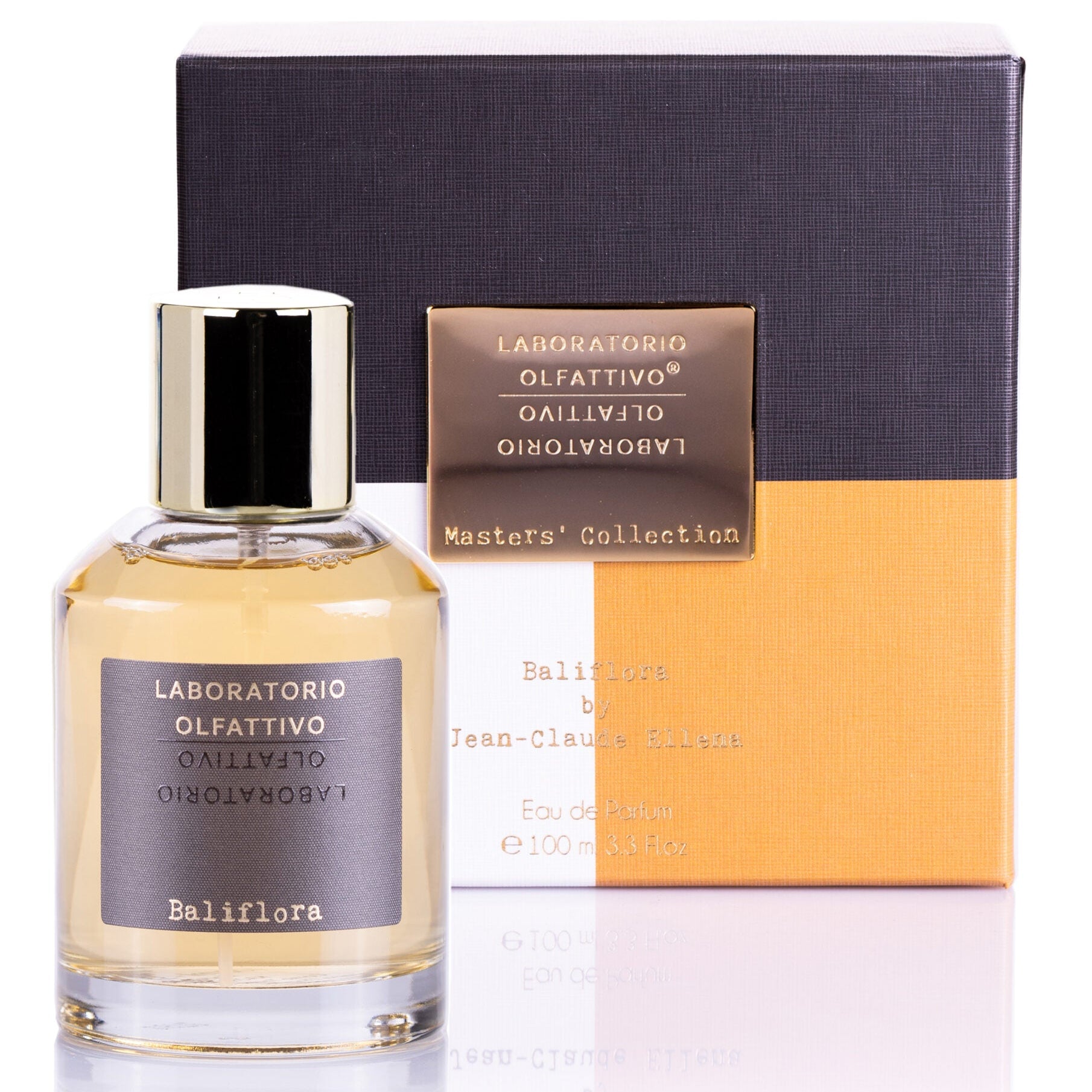 A bottle of Baliflora 100ml Eau de Parfum with a gold-colored cap, next to its orange and navy packaging box.