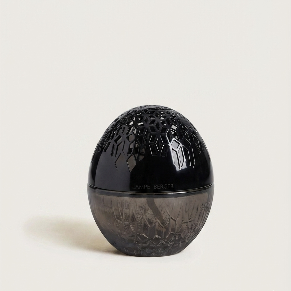 A black and smoky gray egg-shaped Lamp, featuring a textured pattern on the upper half and a faceted lower half.