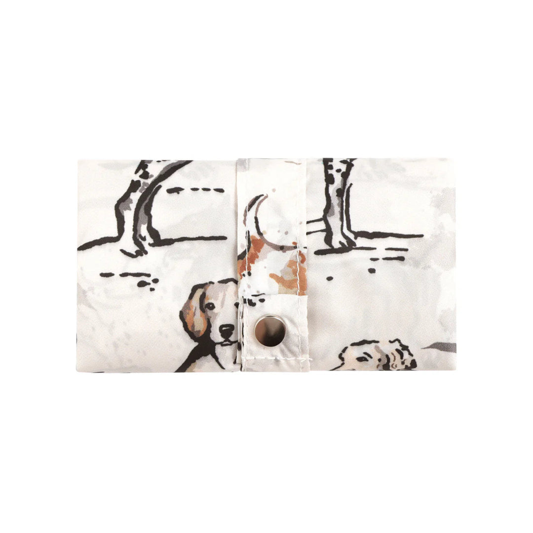 Fabric swatch with dog pattern on a white background