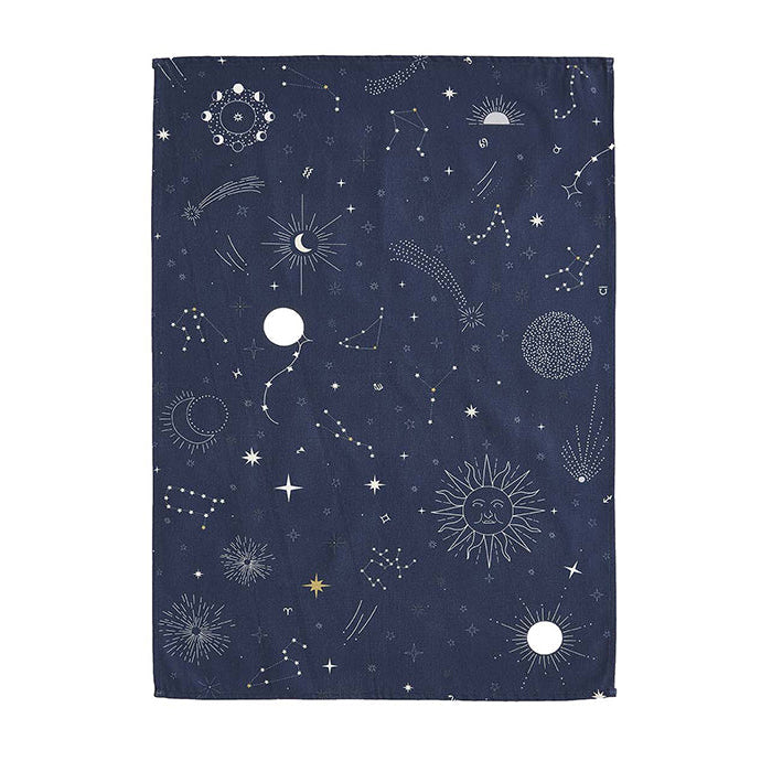 A dark blue cotton tea towel with a celestial pattern featuring stars, moons, and other astronomical bodies.