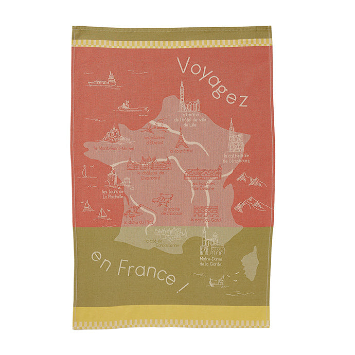 A multicolored cotton tea towel with a map of France print, predominantly red and green, with the text 'Voyage en France' on the lower part.