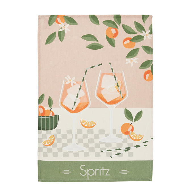 A Coucke Spritz tea towel featuring a colorful design with oranges and leaves on a pink background, and the word 'Spritz' displayed at the bottom.