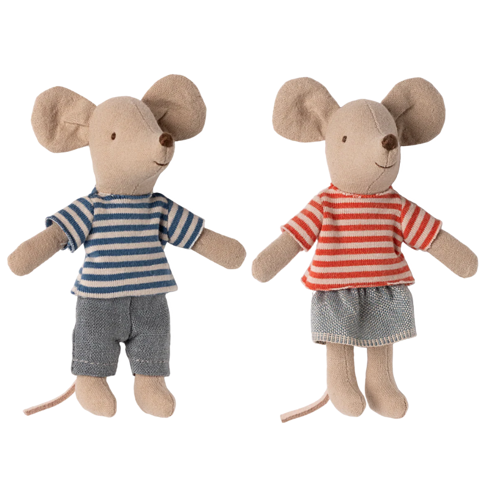 Two toy mice dressed in striped shirts and shorts on a white background