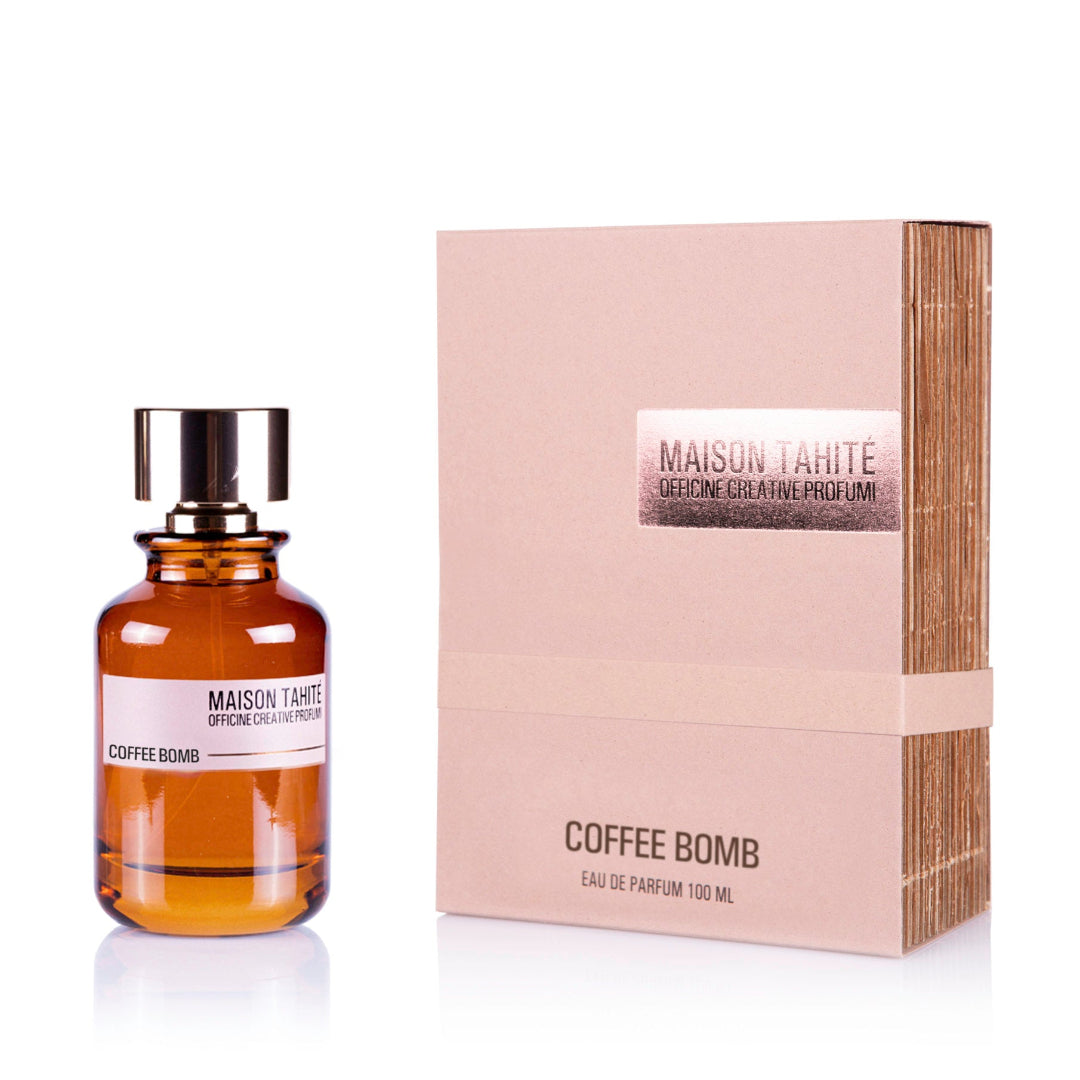 A bottle of 'Coffee Bomb' eau de parfum with its packaging, labeled 'Maison Tahité'