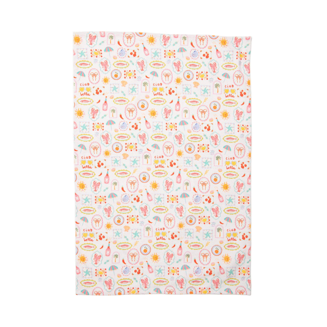 Patterned tea towel with colorful illustrations and text on a white background