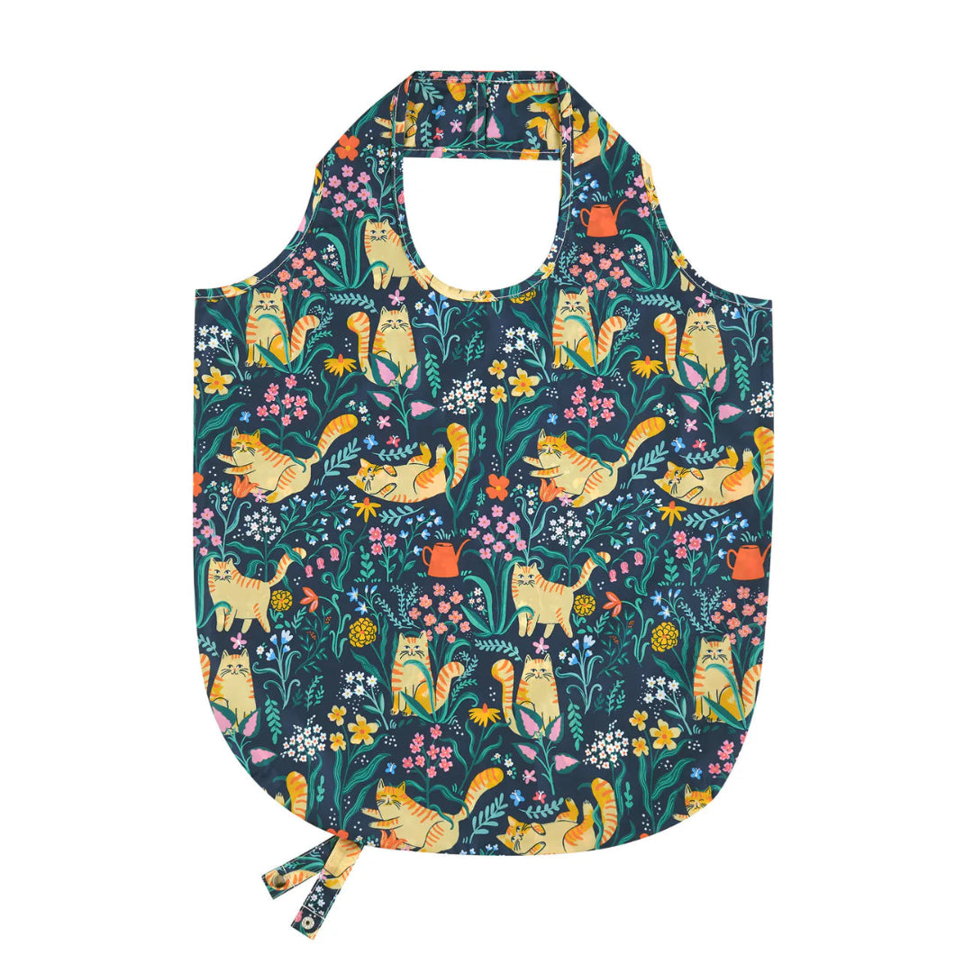 Reusable shopping bag with cat and floral pattern on a white background