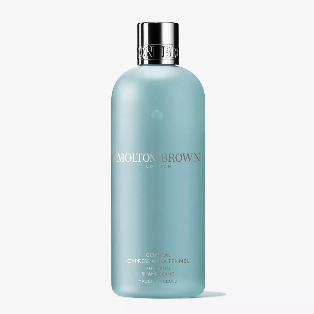 Molton Brown shampoo bottle on a white background