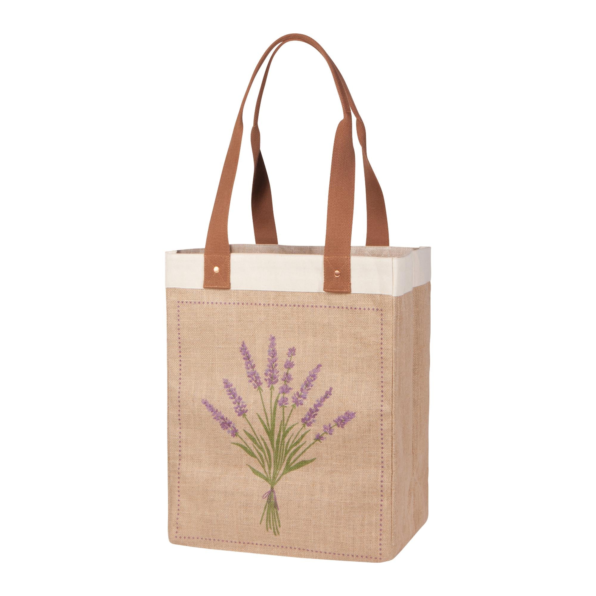 Tote bag with brown handles and lavender design on a white background