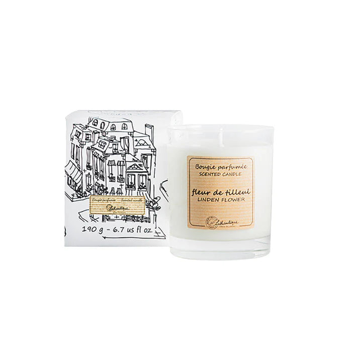 A clear glass scented candle with a label that reads 'Linden Flower' and indicates a weight of 190g/6.7 oz.