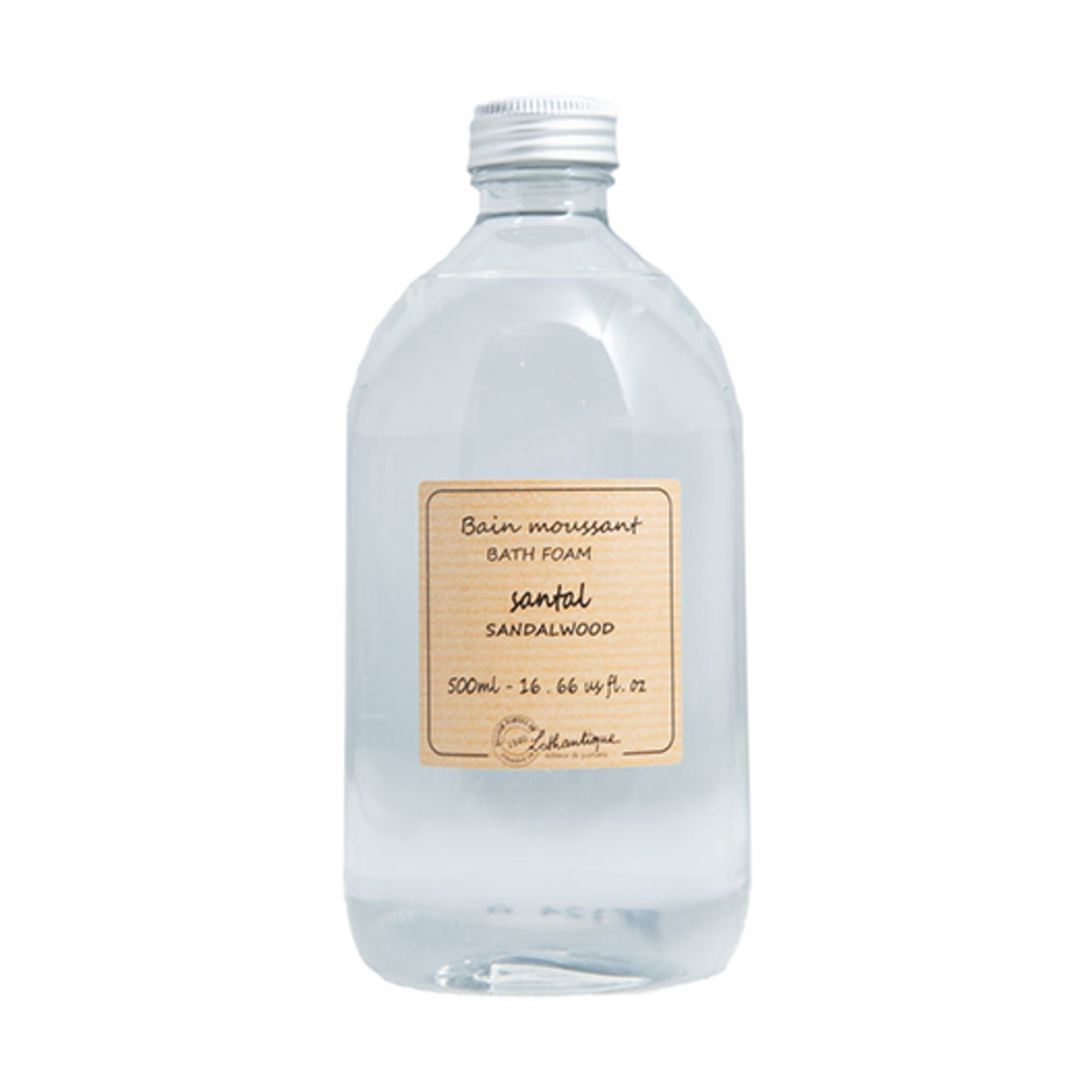 Bottle of bath foam with a sandalwood label on a white background