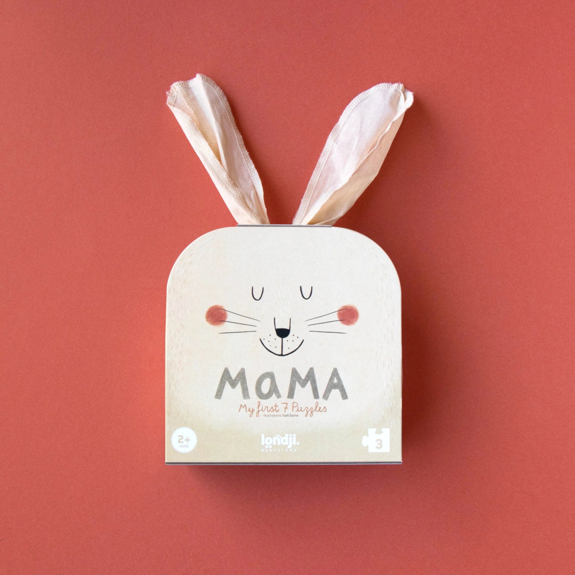 Children's puzzle box with bunny design and 'Mama' text on a red background
