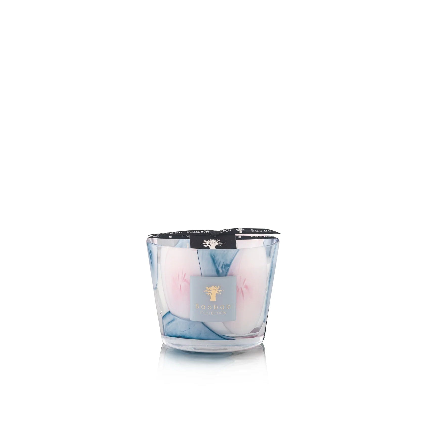 A set of Baobab Riviera Leopolda scented candles in various sizes with transparent glass and pink and blue floral patterns.