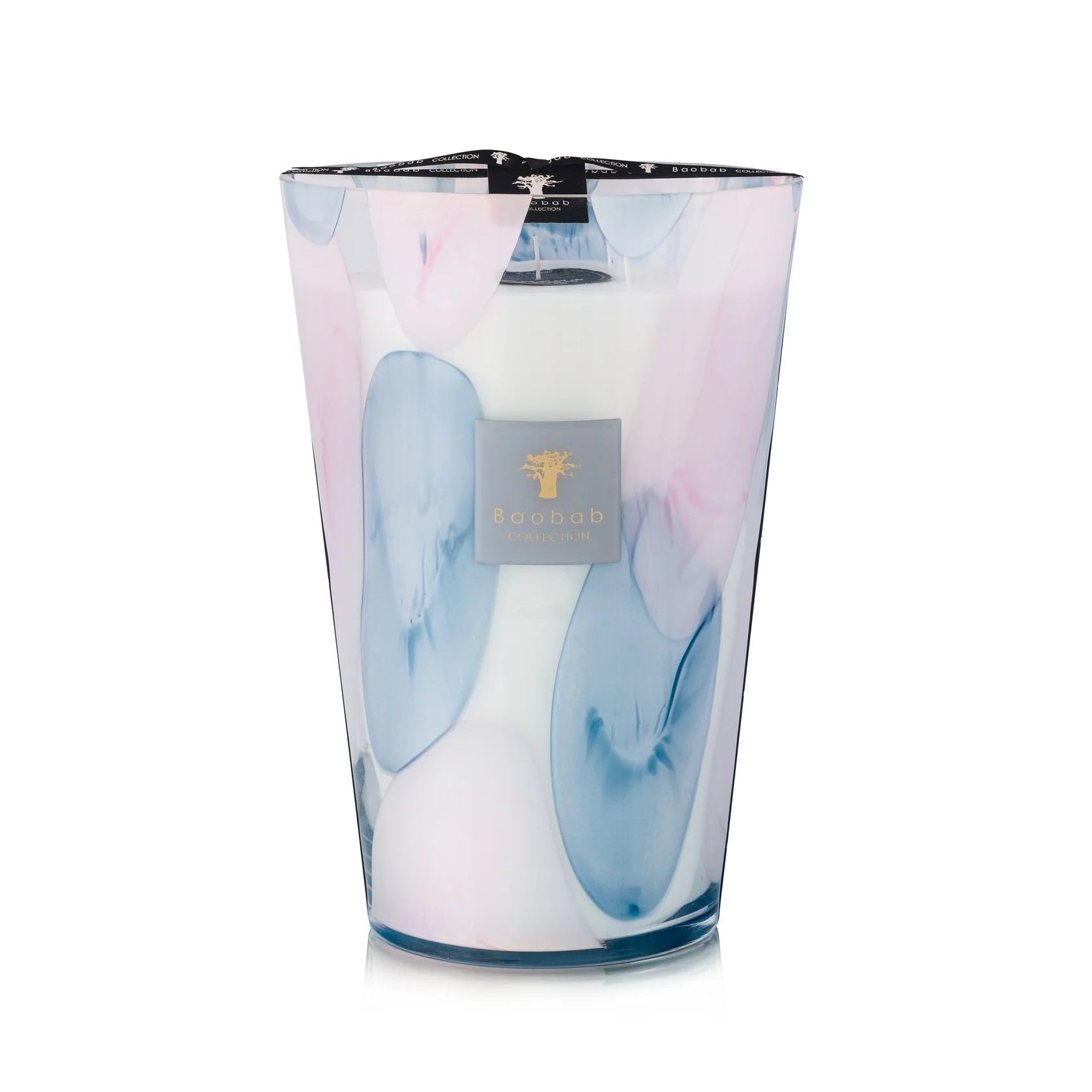 A set of Baobab Riviera Leopolda scented candles in various sizes with transparent glass and pink and blue floral patterns.
