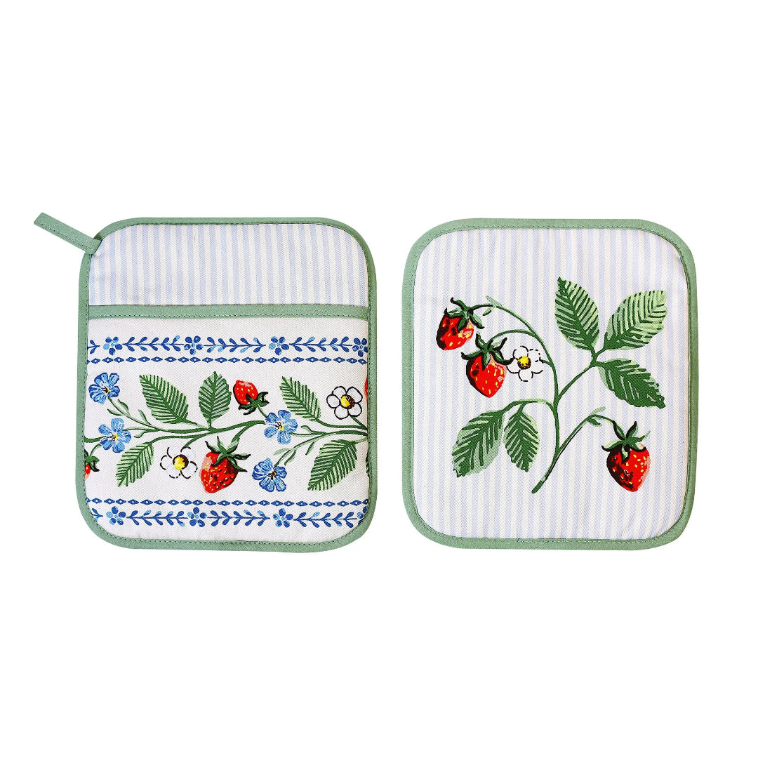 Two embroidered pot holders with strawberry designs on a white background