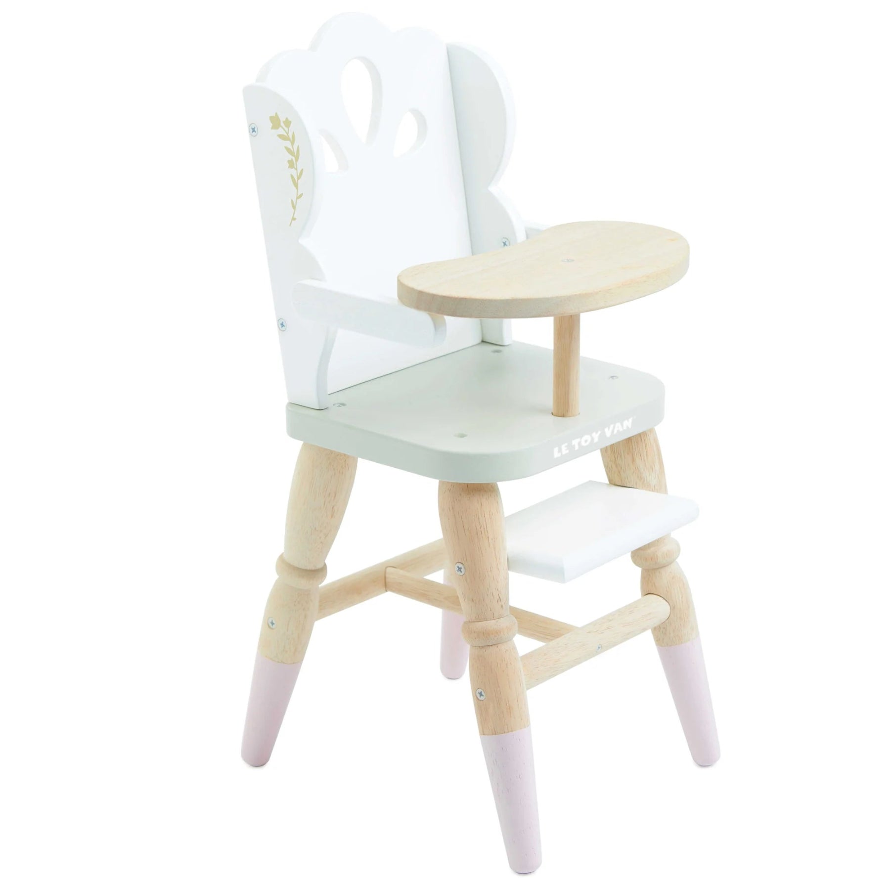 A wooden high chair for dolls with a white tray table, spindled legs, and floral cut-out detailing.