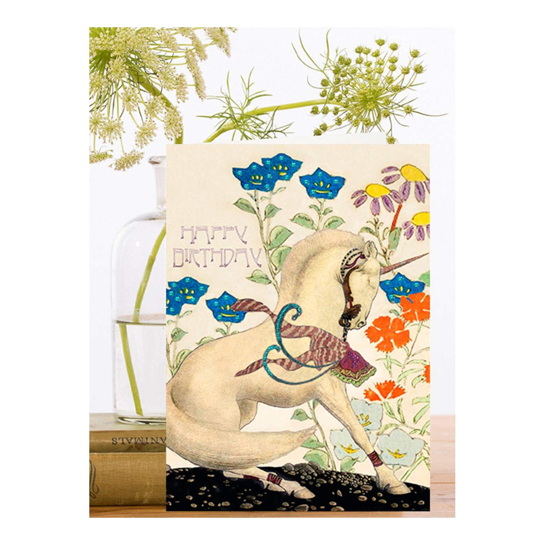 Carte d'anniversaire pailletée avec une main de licorne