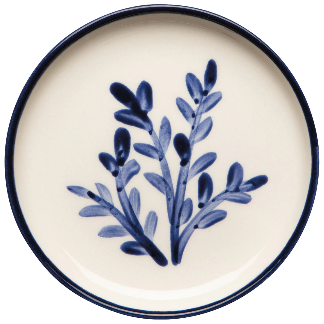 Ceramic plate with blue floral design on a white background