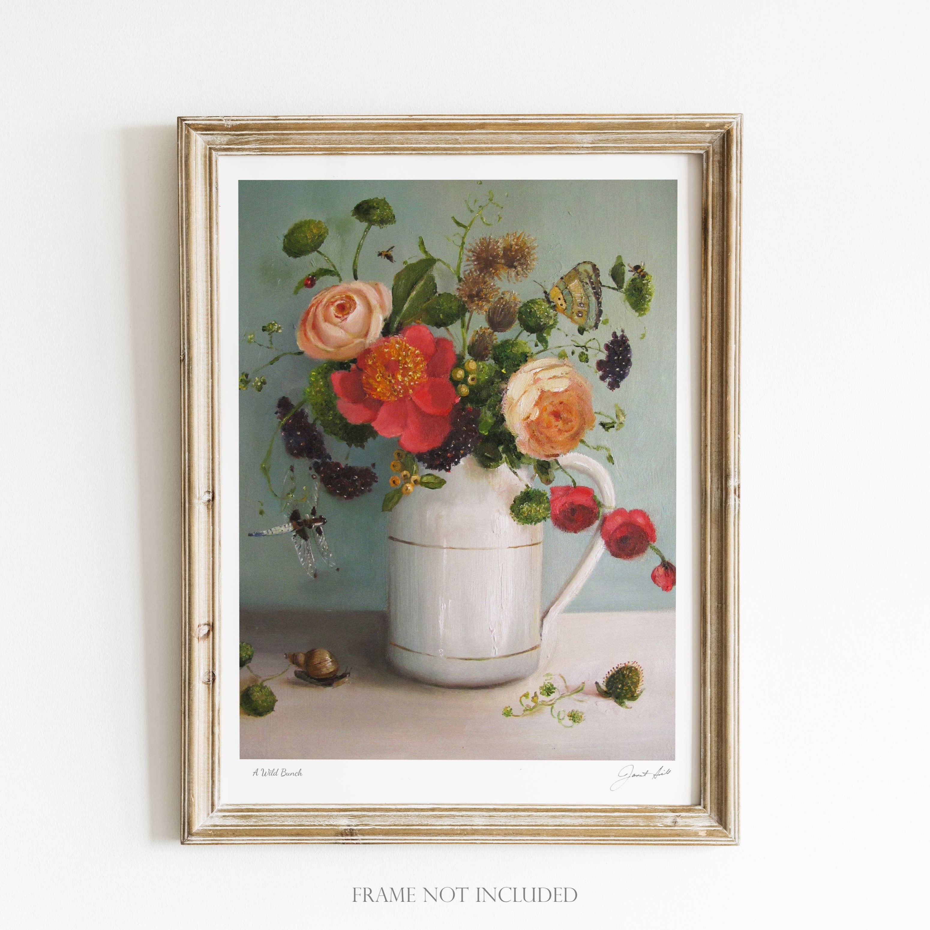 A framed art print featuring a vase with a bouquet of multicolored flowers and a butterfly, set against a light blue background, with the text 'Frame not included' at the bottom.
