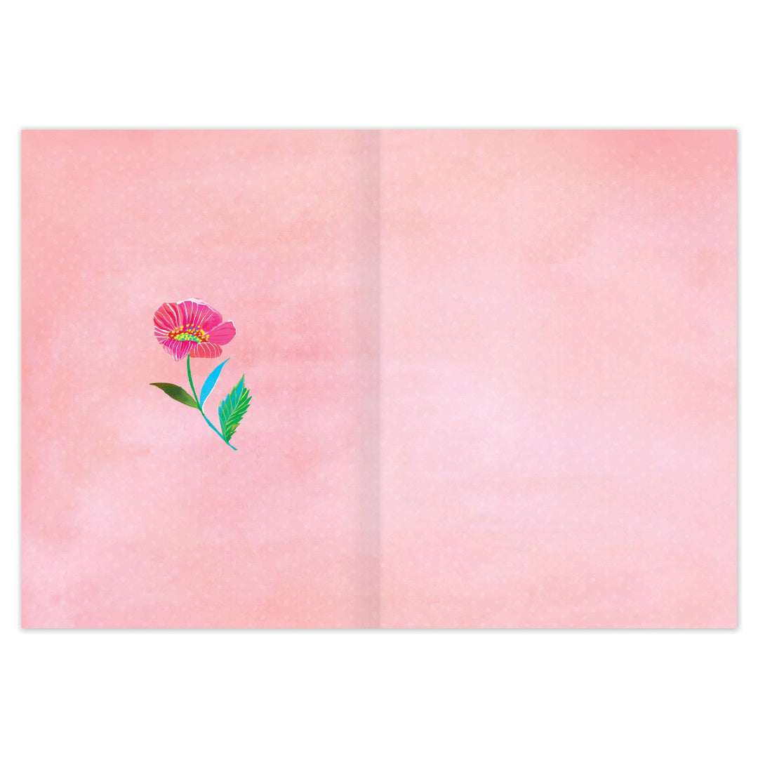 Open card with a pink flower illustration on a pink background