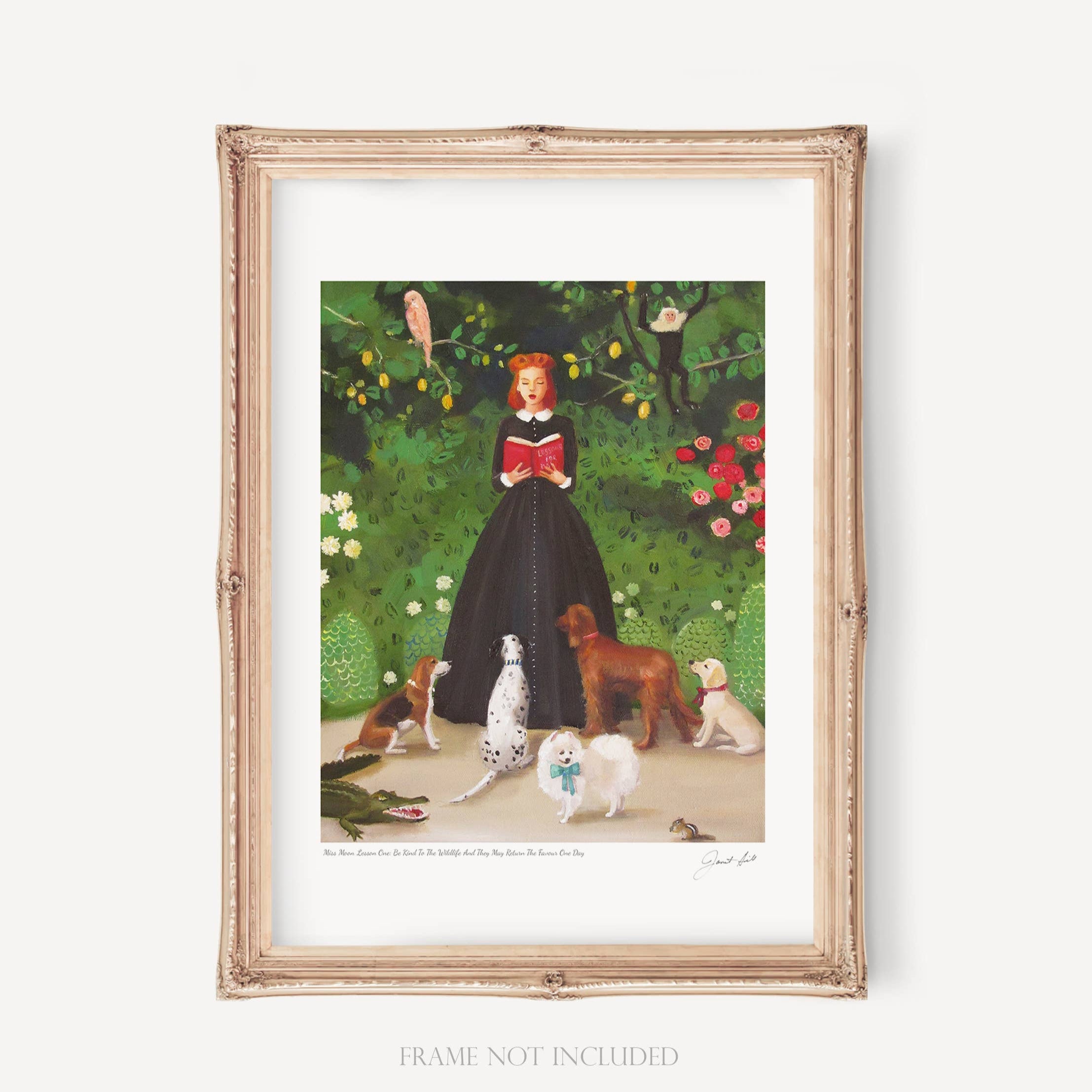 A framed art print featuring a woman reading to a group of dogs and a cat, with a green backdrop and a red bench.
