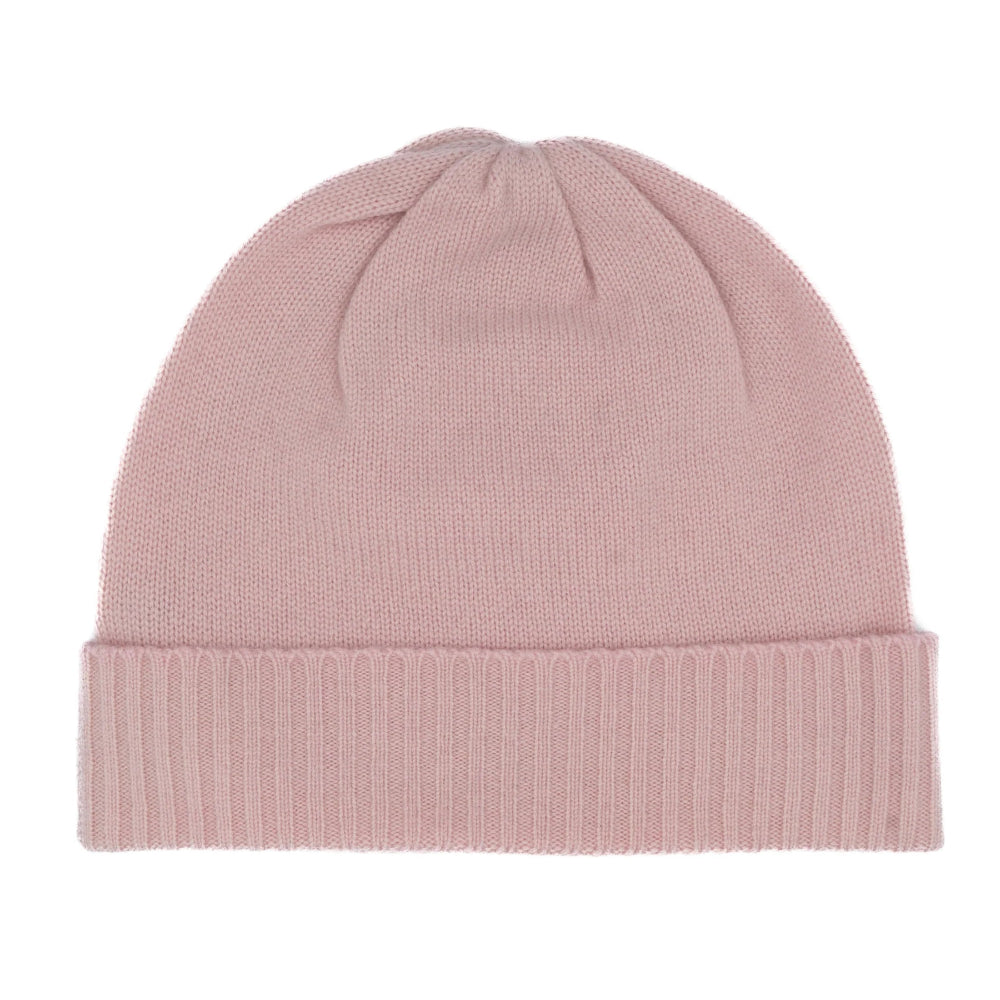 Pink beanie hat on a white background