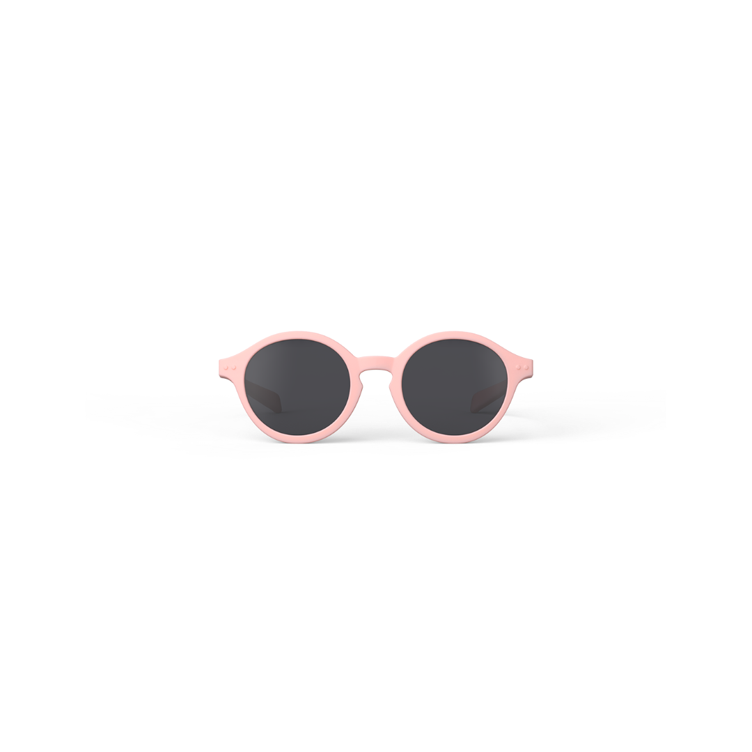 Pink sunglasses with black lenses on a white background