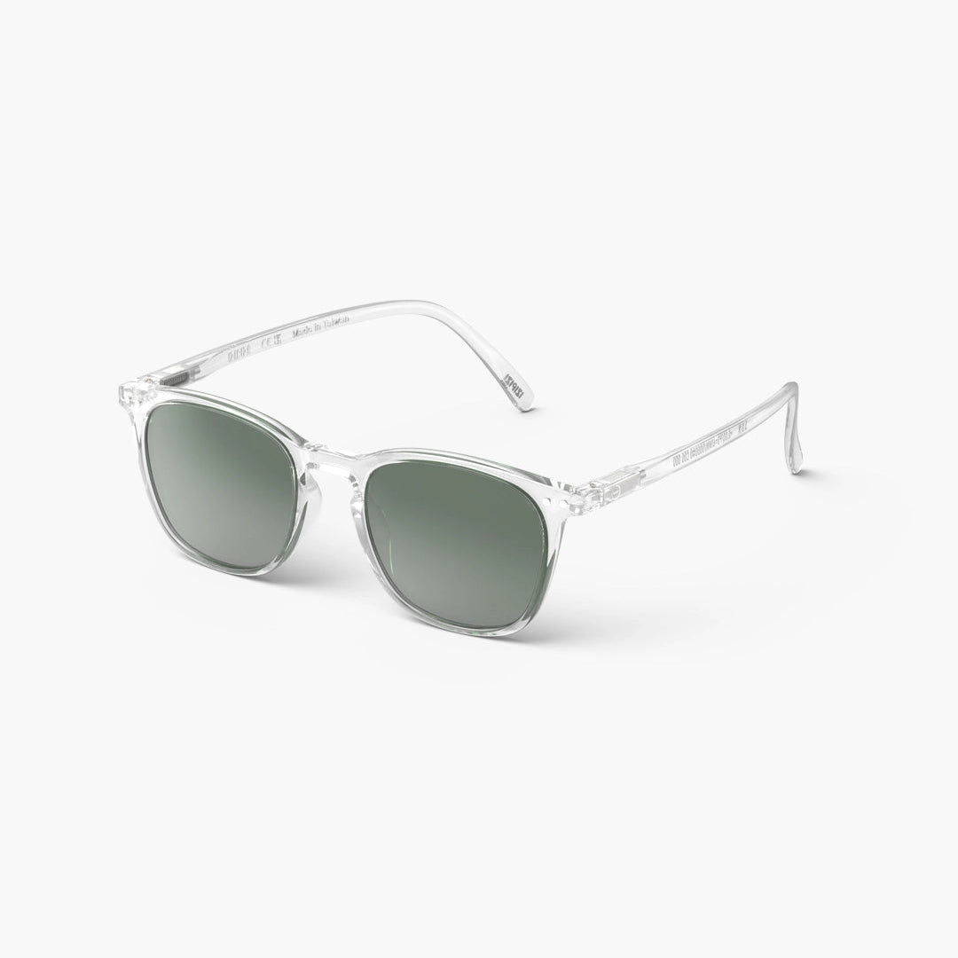 A pair of IZIPIZI #E Crystal Polarized Sunglasses with a transparent frame and green polarized lenses.