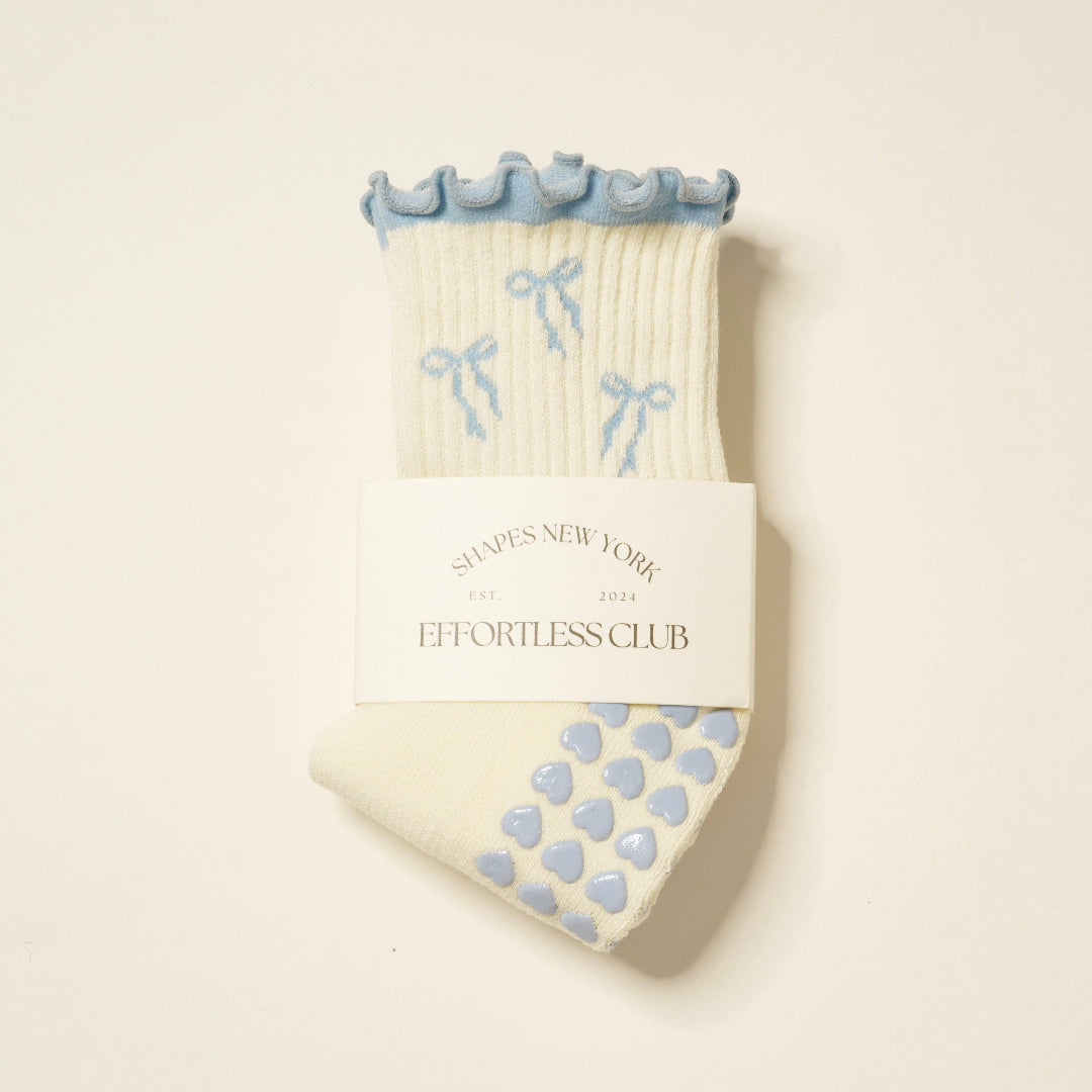 Pair of socks with blue accents on a white background