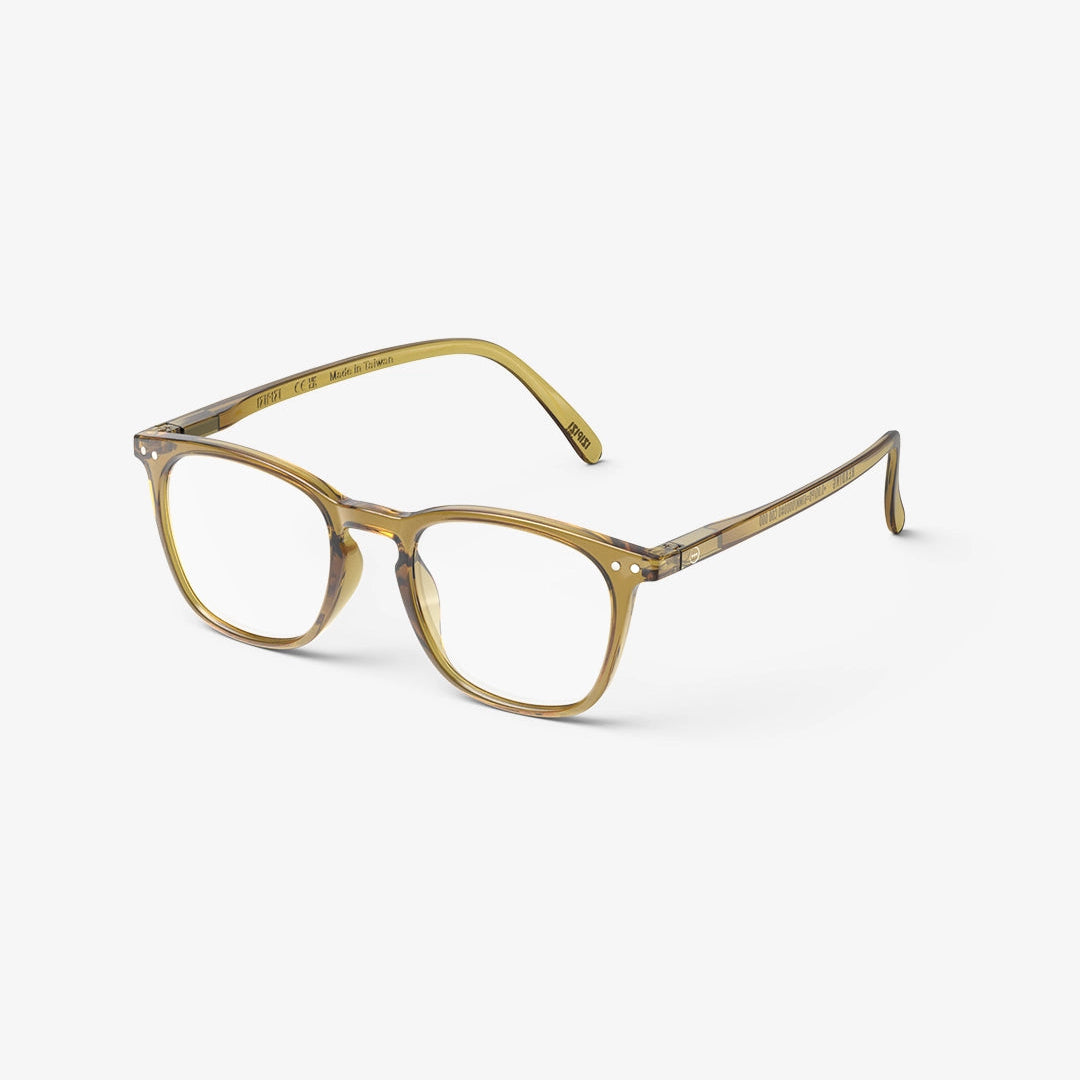 A pair of IZIPIZI #E Reading Glasses in Golden Green color, featuring a trapezium shape frame.