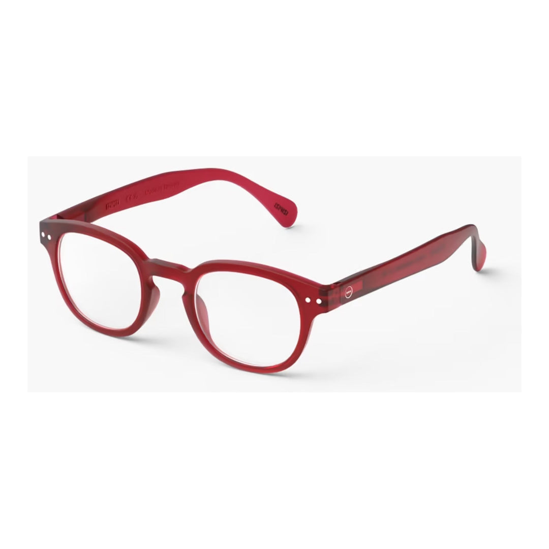 Red eyeglasses on a white background
