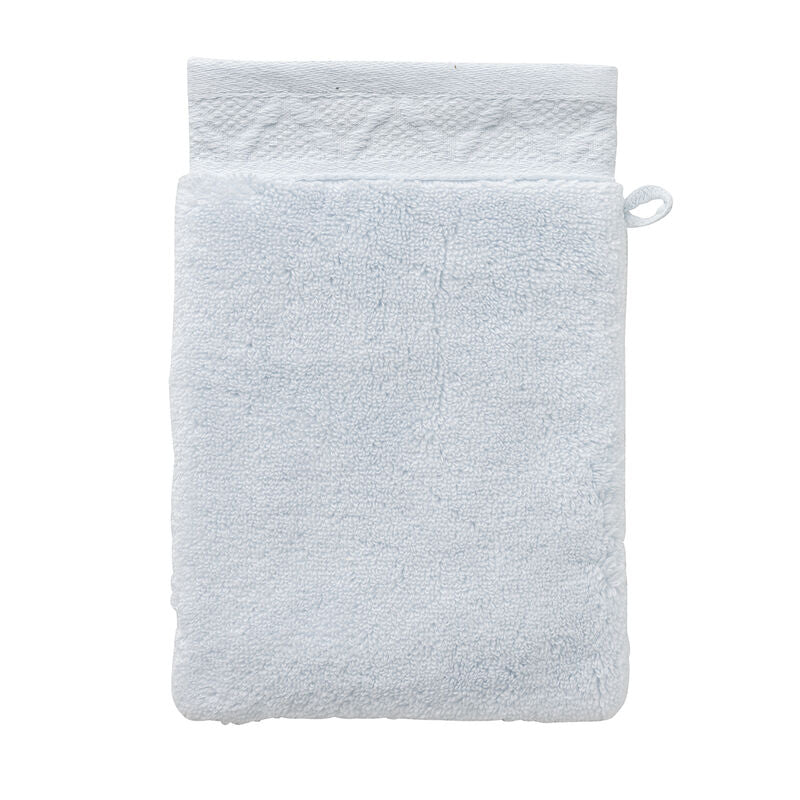 White textured washcloth on a white background