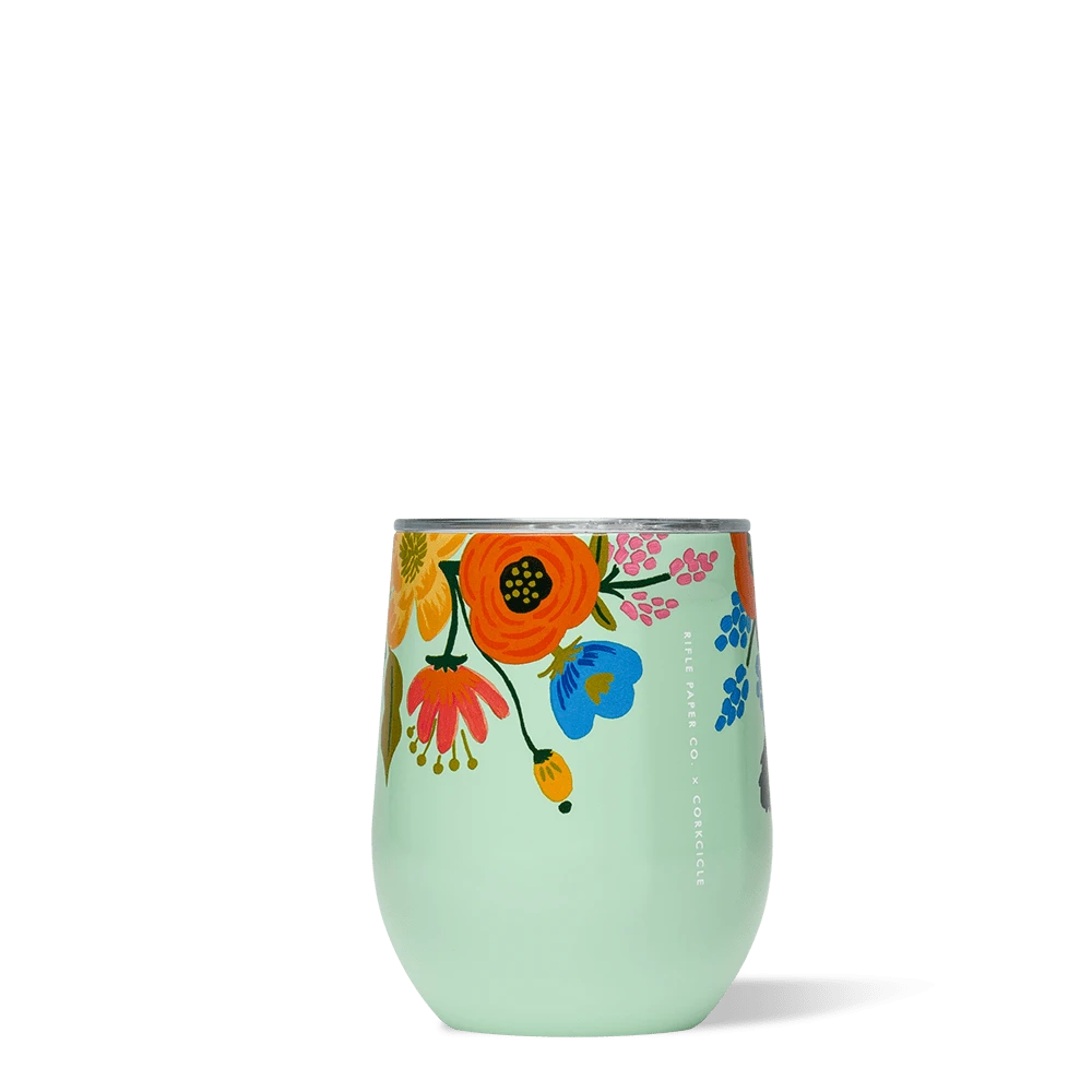A stainless steel stemless cup with a colorful floral pattern and the brand name 'Rifle Paper Co.' on the side.
